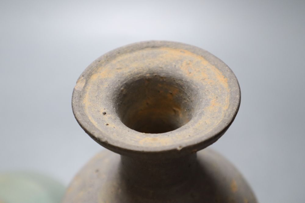 A Korean celadon saucer dish, Goryeo dynasty, 17cm and a Korean stoneware bottle vase, 23cm